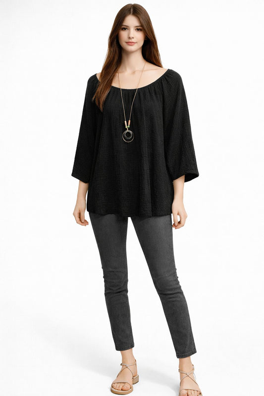 T-shirt  Louna femme fluide et confortable à coupe ample. Disponible en plusieurs couleurs, idéal pour un look chic, décontracté et tendance au quotidien.